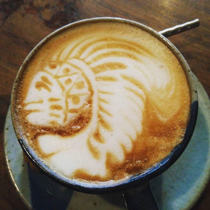 Indian chief in my cappuccino, because Ubud baristas have some kind of continuous who-can-draw-best-on-foam contest going on.